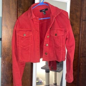 Red small cropped jacket.
